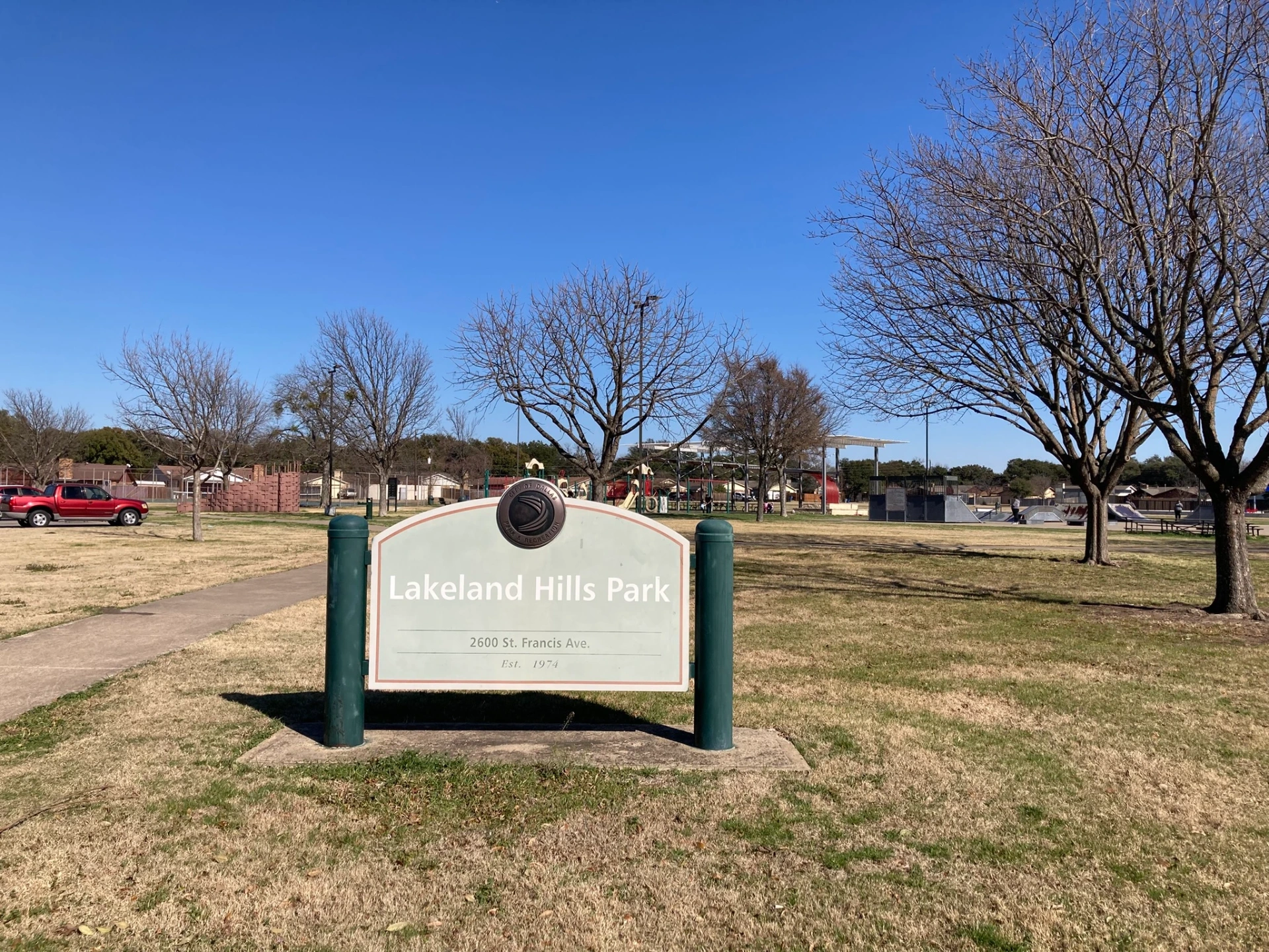 Lakeland Hills Park in East Dallas featuring playground, skate park, and green spaces at 2600 St. Francis Ave